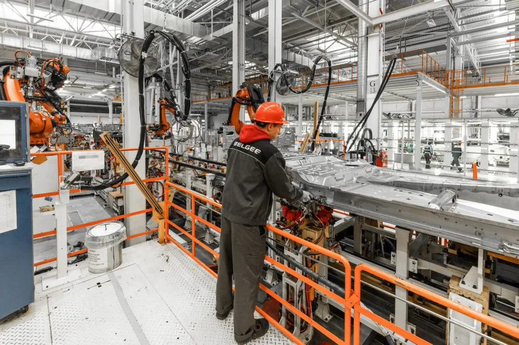 image of a man wearing a hard hat in a factory